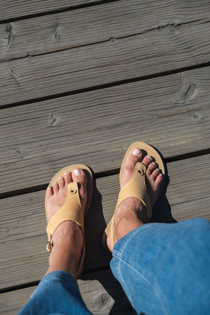 BeLenka Promenade barefoot sandals on a wooden deck