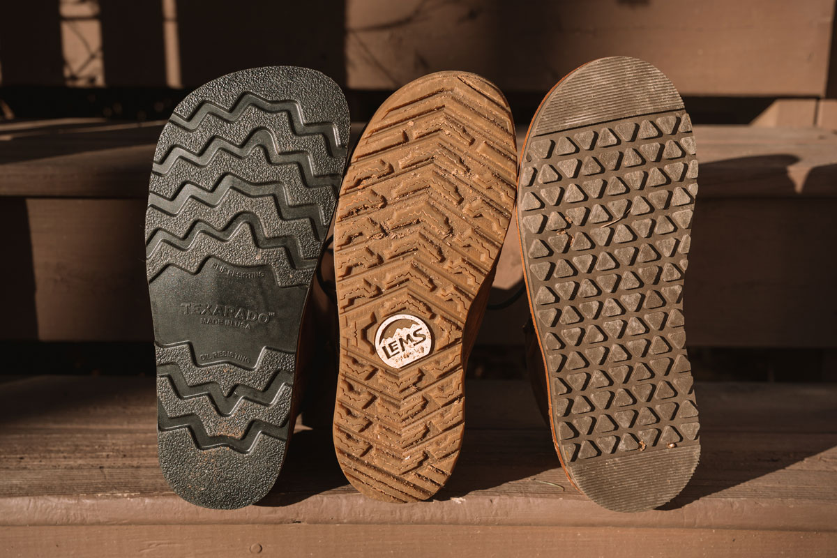 Soles of three wide toe box work boots: Texarado Decatur, Lems Boulder Summit, and Jim Green African Barefoot Rangers