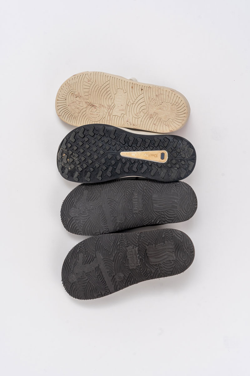 Soles of the wide toe box shoes from Dolfie Paradise including wide toe box sneakers, loafers and boat shoes