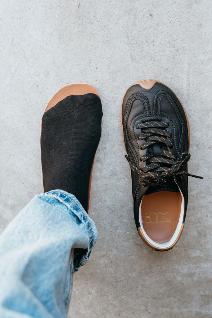Foot over insole of the Lejan Sakura barefoot sneaker to show the fit